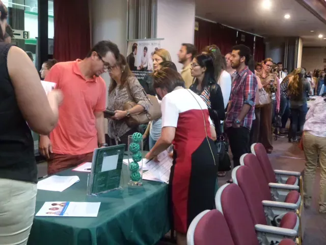 People line up for Triple P information in Costa Rica