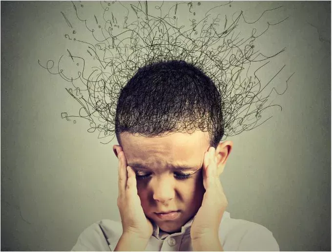 boy_with_stress_squiggly_head_SMALLER_iStock-507421194.webp